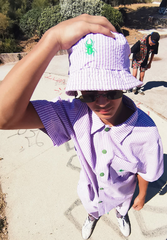 MARJ sustainable bucket hat in lilac lavender white striped seersucker and green beetle