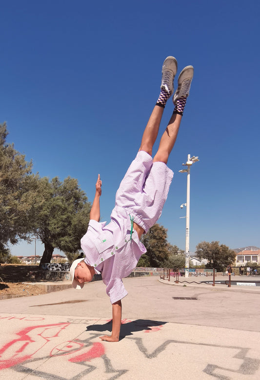 MARJ sustainable streetwear bermuda shorts in lavender and white striped seersucker